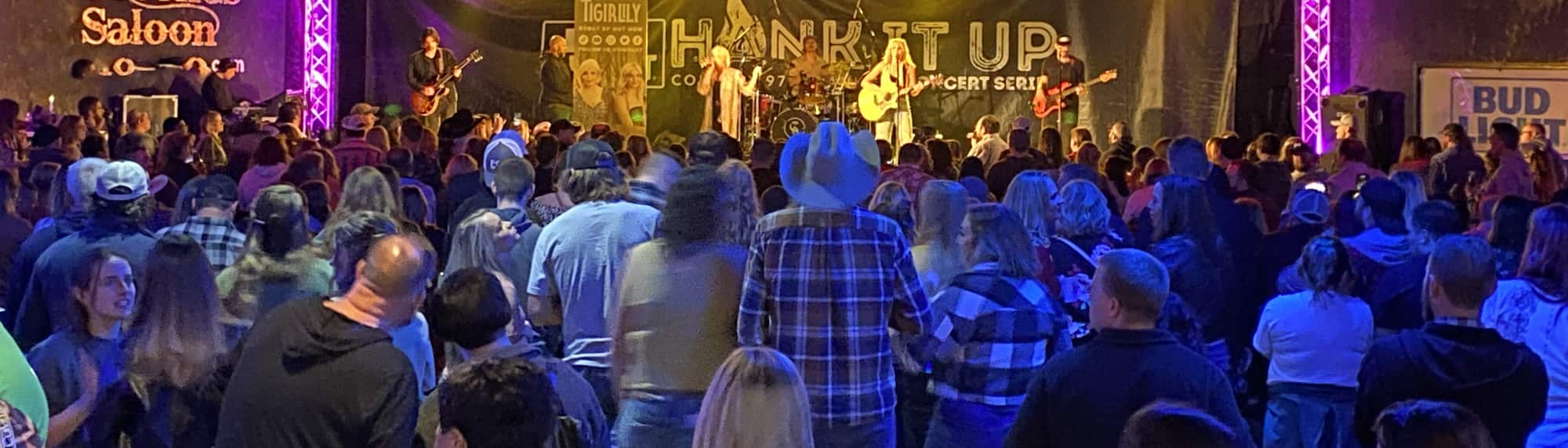 country concert with fans wearing cowboy hats West Lafayette