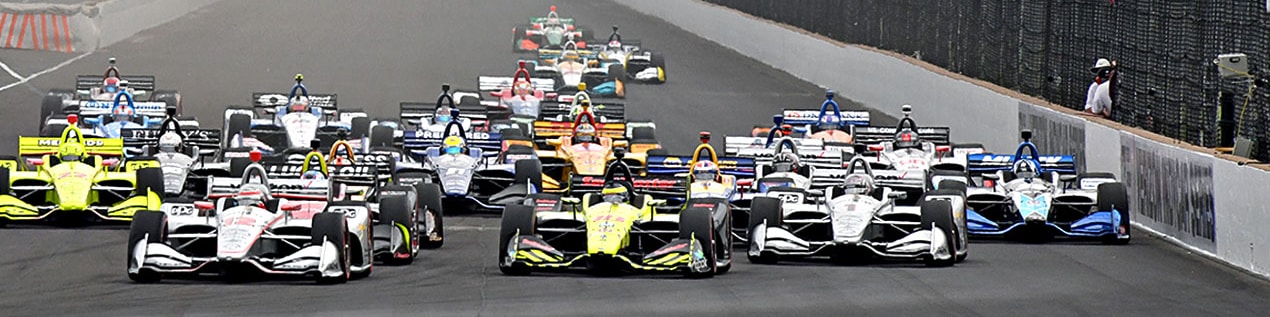 indy cars racing to through the start line West Lafayette
